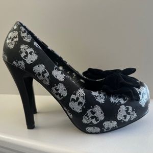 Iron fist sparkly skull heels